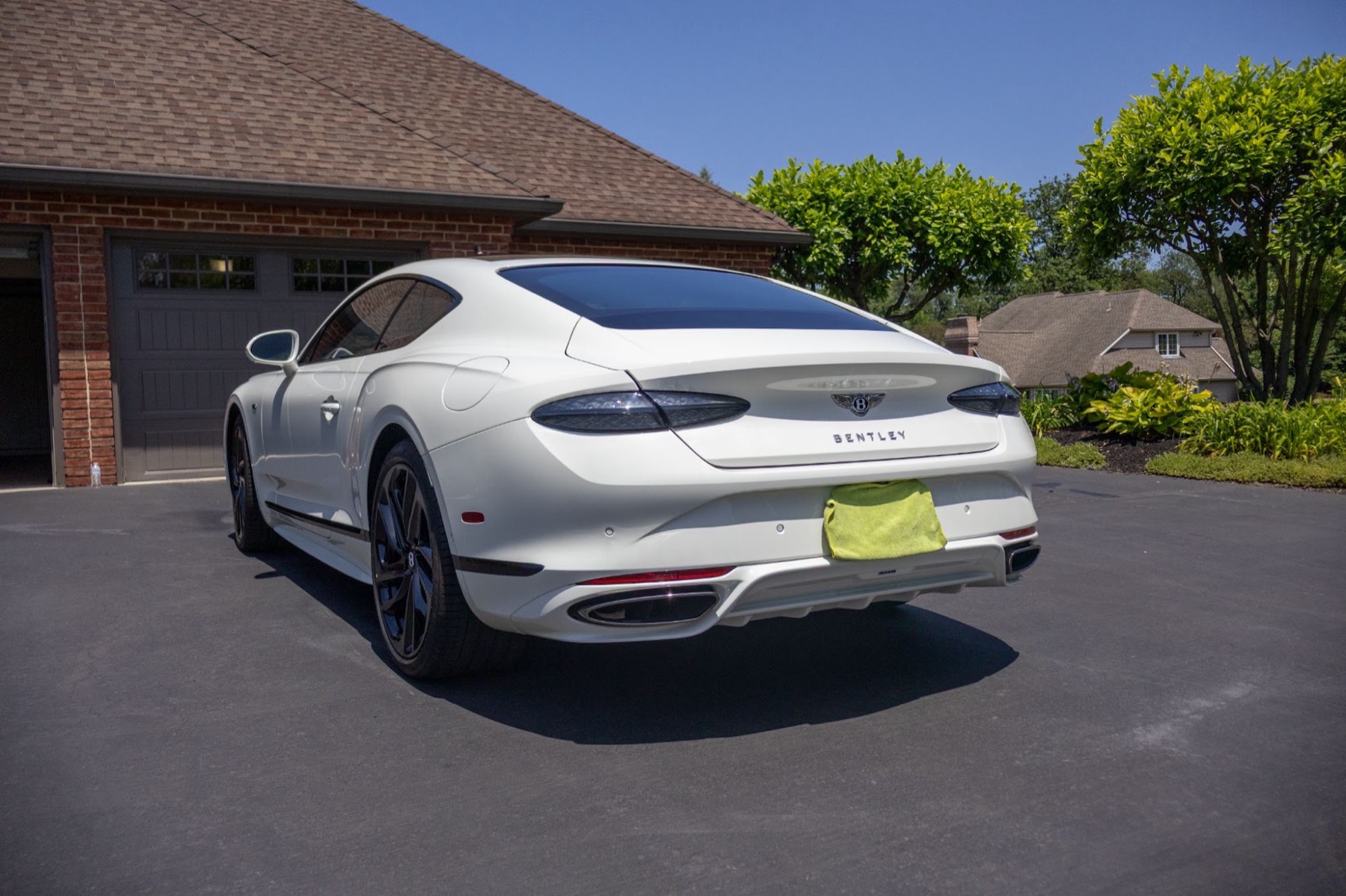 Luxury car in front of a home