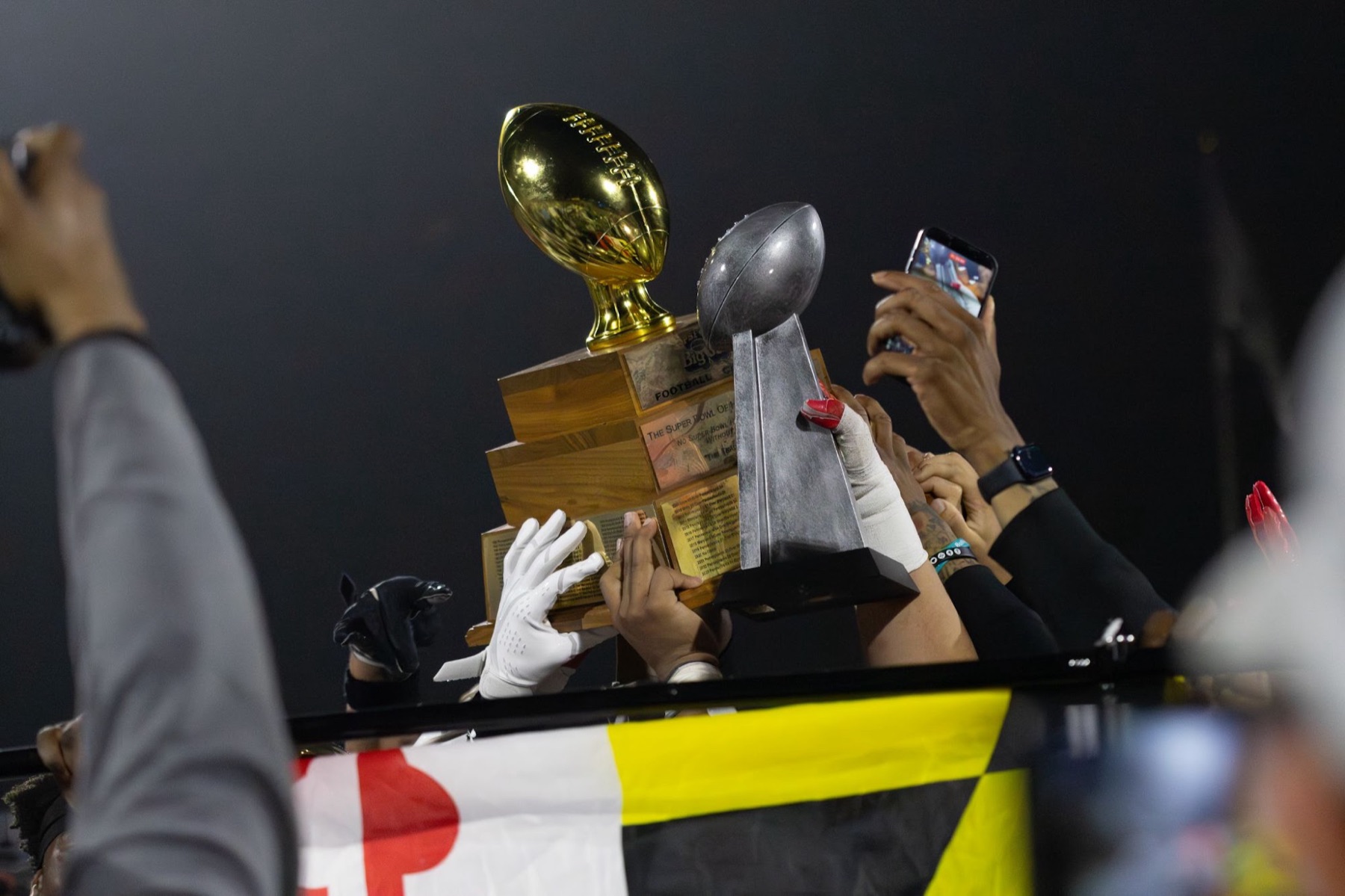 Players lifting a championship trophy